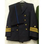 Collection of uniforms including full German Police uniform, Austrian Officer jacket, pair of