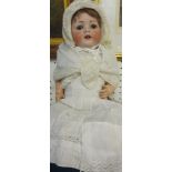 A Catterfelder Puppenfabrik bisque headed doll with sleep eyes and open mouth, stamped to reverse