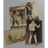 Collection of photographs and re-prints of traditional boxers in two albums.