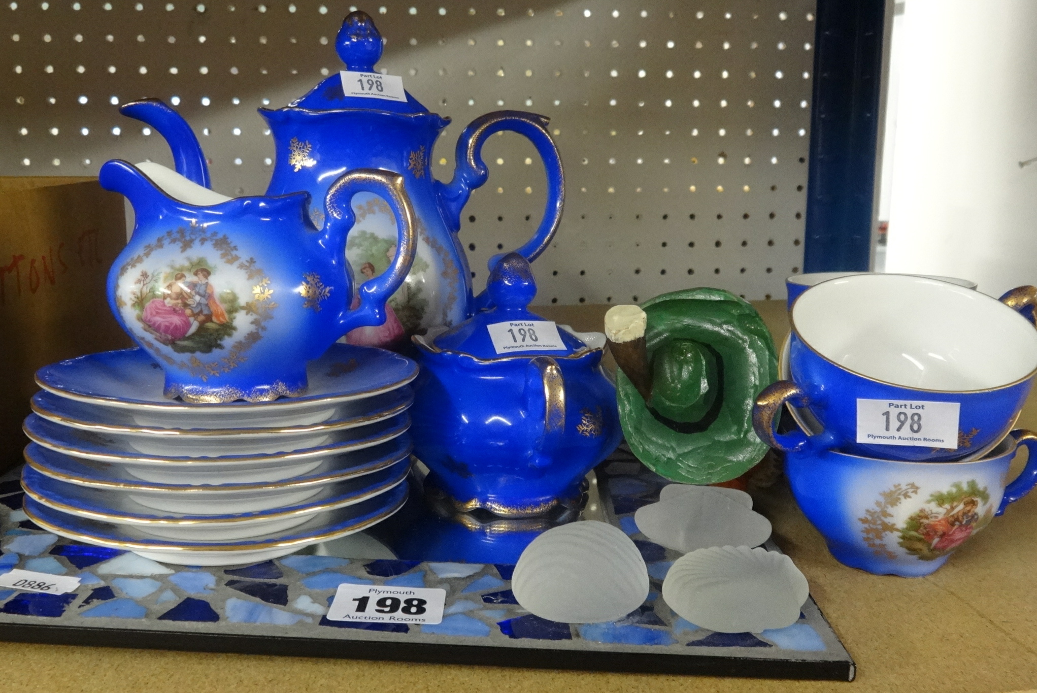 A continental porcelain tea service decorated with classical scene, modern mirror and other