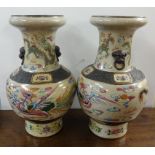 Pair of Japanese crackle glazed vases, height 38cm.