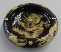 Modern ornate Chinese dragon bowl decorated in high relief, with red silk box, 32cm diameter with
