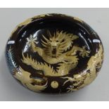 Modern ornate Chinese dragon bowl decorated in high relief, with red silk box, 32cm diameter with