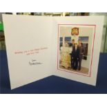 The Prince of Wales 1997 Christmas card signed by Charles with embossed gilt royal cipher to the