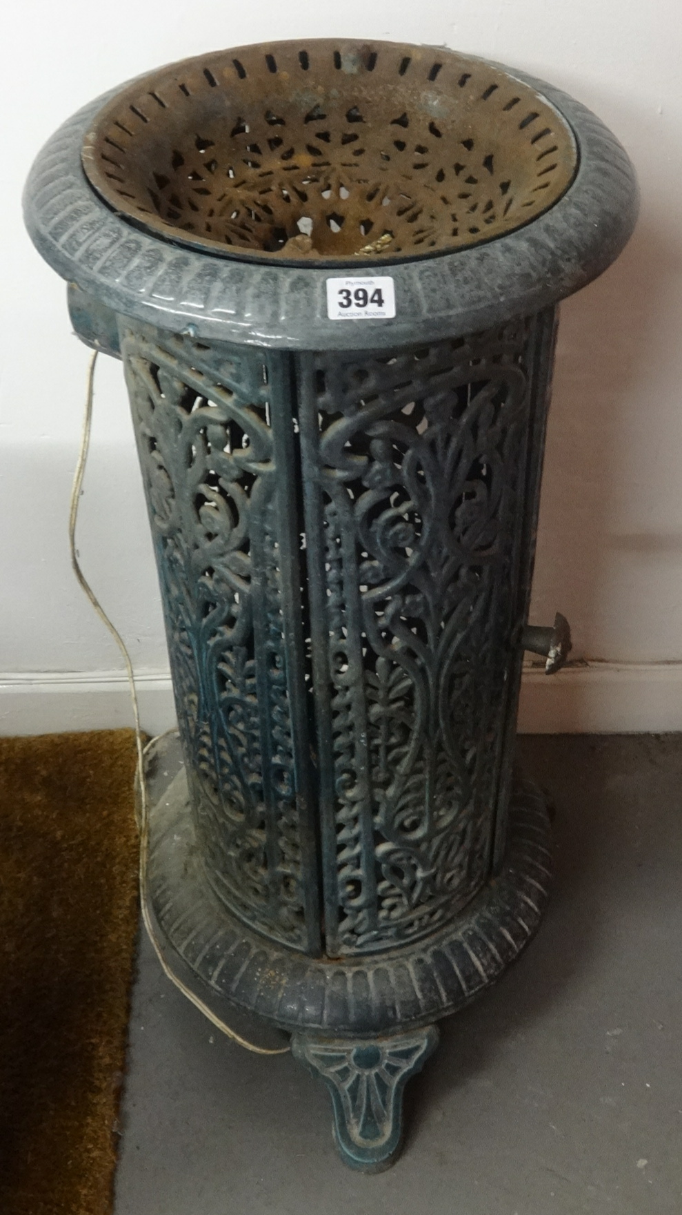 A French enamel heater (converted for lighting) and a cast iron small cooking range (2)