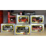 Burago, twelve scale Diecast models, boxed.