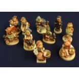 Ten various Hummel figures, also a limited edition print 'Happy Days' by Reaul no 18/500.