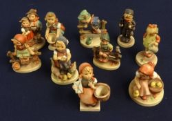 Ten various Hummel figures, also a limited edition print 'Happy Days' by Reaul no 18/500.