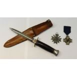A Royal Marine Commando dagger, Kampa Milbro Sheffield with scabbard and 2 German medals.