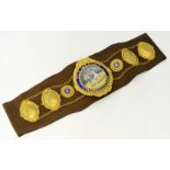 BOXING BELT a 9ct gold and enamelled boxing belt won Johnny Chislett (1901-1967) in 1922, titled '