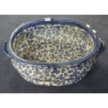 A reproduction Victorian blue and white footbath or planter, width 44cm.