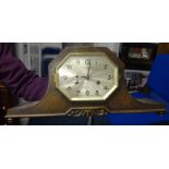 An oak cased mantle clock circa 1920, retailers Page, Keen & Page.