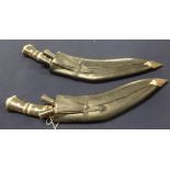 A pair of Kukri knifes.