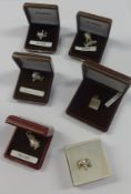 Collection of various modern silver charms (15).