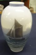 A Royal Copenhagen porcelain vase, decorated with a sailing boat, height 19cm.