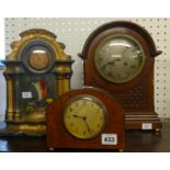 A burr walnut cased mantel clock by Colin Wood, with Swiss movement also a pottery cased clock and