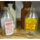 Various old collectables including Shell oil can, vintage milk bottles, vintage leather suitcase,