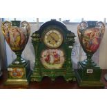 A three piece clock garniture set, continental porcelain, richly decorated in gilt work with