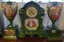 A three piece clock garniture set, continental porcelain, richly decorated in gilt work with