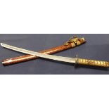 A reproduction Japanese samurai sword and a similar short sword with stands, accessories,
