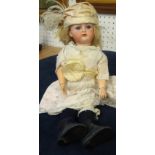 A Simon and Halbig, K & R, bisque headed doll, with composition jointed body, height approx 34cm