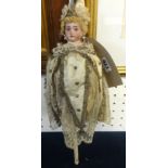 An Armand Marseille Marotte doll marked 'AM 11/0, 3200' with set blue eyes, original clothing