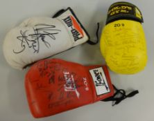 Three signed boxing gloves, multiple signatures including Scott Dann and Tim Wetherspoon etc, also