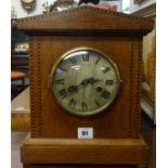 Junghams mantle clock with strike on gong, with key and pendulum.