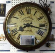 A large electric wall clock circa 1922 diameter 22 inches.