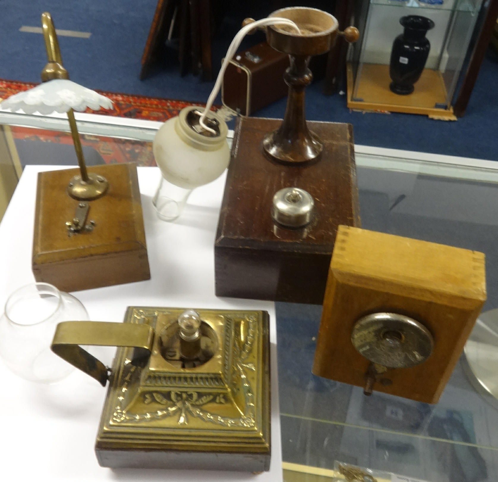 Four antique bedside lights circa 1910.