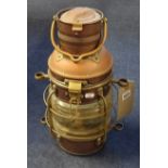Copper and Brass ships lantern, height 50cm with handle up.