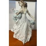 A Lladro figure, The Summer Serenade, boxed with certificate.