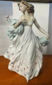 A Lladro figure, The Summer Serenade, boxed with certificate.