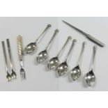 Set of six English Silver teaspoons, silver fruit and paper knife, pickle fork and two others.