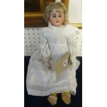 A German bisque head doll with leather body, sleep eyes, open mouth, height approx 50cm