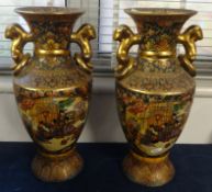 A pair of Japanese satsuma style vases height 36cm.