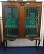 An Edwardian mahogany two door display cabinet