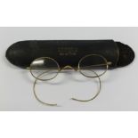 Six vintage spectacles (one in case).