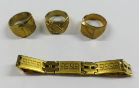 Three gold effect signet rings and a similar bracelet.