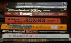 A collection of books on boxing, also boxing magazines.