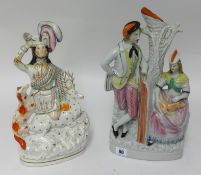 Two Victorian Staffordshire groups, Highland figure and a Courting Couple by a Tree, tallest 40cm (