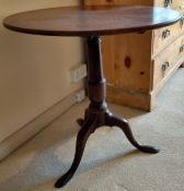 A 19th century mahogany tripod table.