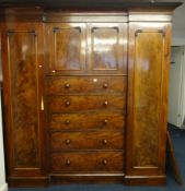 A 19th century mahogany Sentry compactum wardrobe, the pair of full length hanging cupboards
