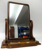 A Victorian mahogany dressing table mirror and another mirror with acorn brass finial (2).