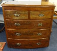 A Victorian mahogany bow fronted chest fitted with brass plate handled, two short and three long