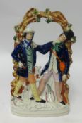 A Victorian Staffordshire group, 'Poacher and Gamekeeper', height 34cm.