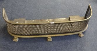 A Victorian brass fenders, width 94cm.