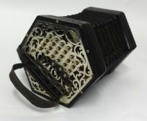 Lachenal & Co, a Concertina, with forty seven buttons in a hexagonal pierced steel grill, with carry