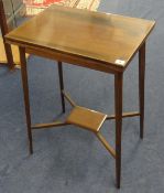 A small Edwardian mahogany and cross banded fold over card table, width 54cm.