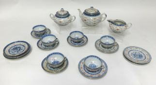 A modern Chinese design porcelain dinner service and a blue and white Chinese bowl
